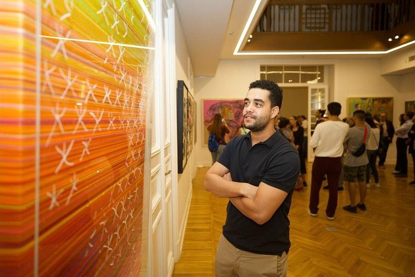 الممثل المصري خالد أنور أثناء زيارته معارض اَرت دي إيجيبت 2022
