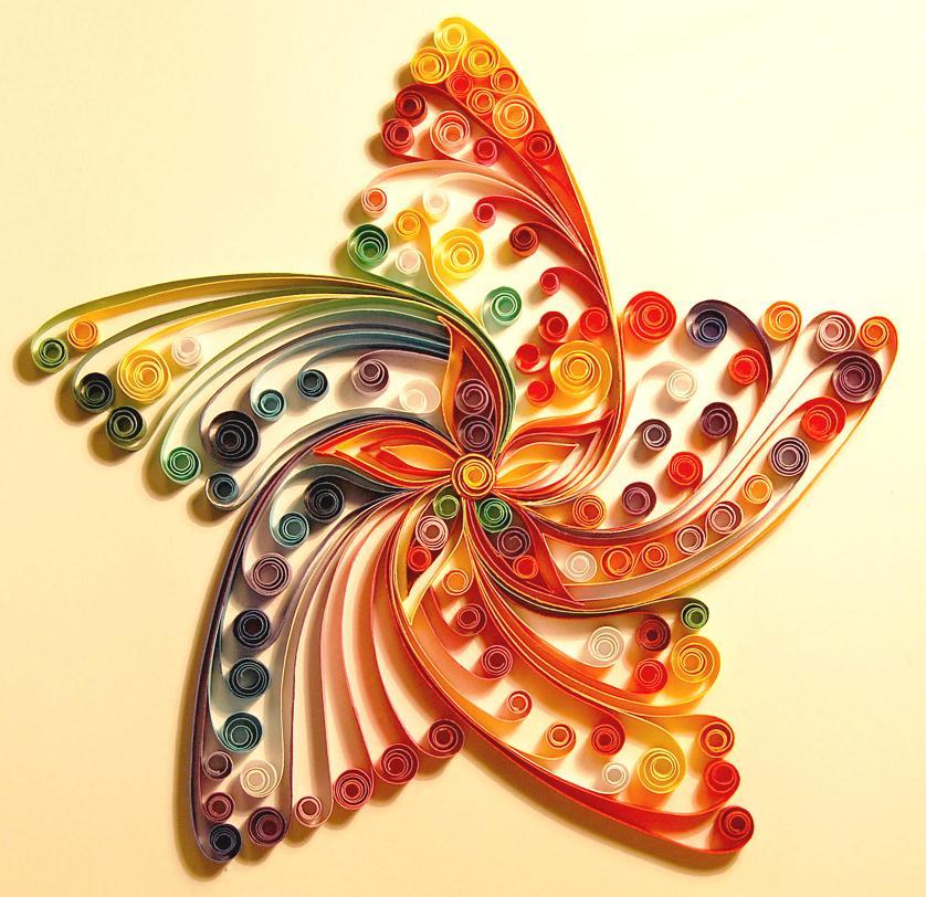 صور فنية مدهشة بالورق الملوّن Image?url=https%3A%2F%2Fcdn.arageek.com%2Fmagazine%2Fibda3world%2F2011%2F03%2FQuilling_star_by_iron_maiden_art1