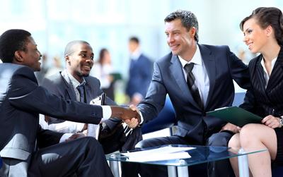 Business people shaking hands, finishing up a meeting