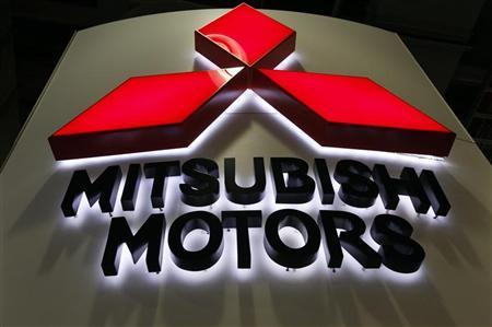 A Mitsubishi Motors logo is seen on display at the New York International Auto Show in New York City بدايات شركات السيارات