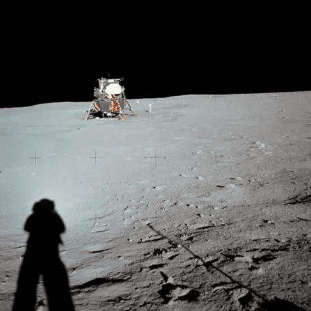 A person standing on the moon</p>
<p>Description automatically generated