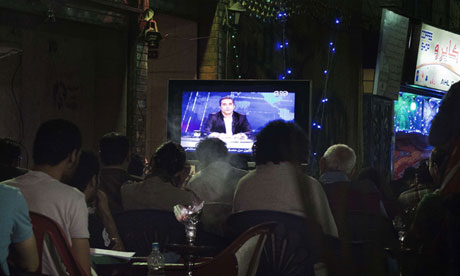 Egyptians watch comedian Bassem Youssef